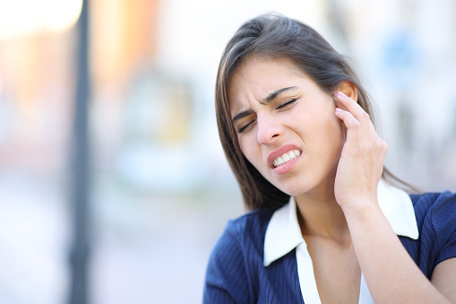 Stressed woman complaining suffering earache