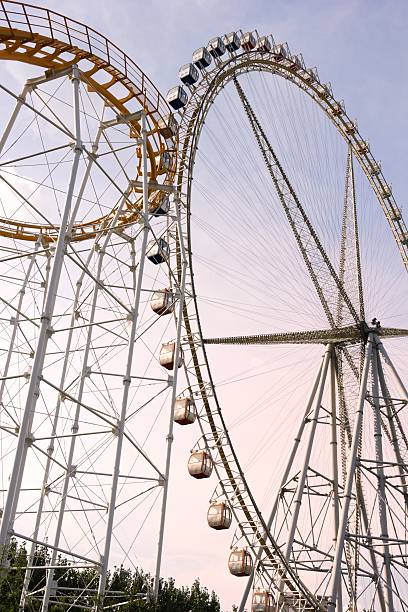 istock Roller Coaster and Ferris Wheel at Sunset 149425478