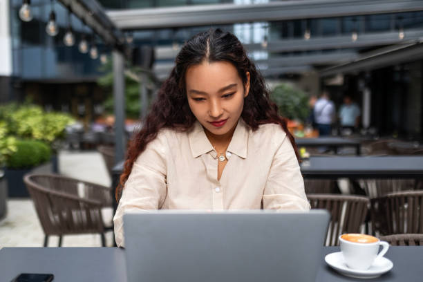 istock Asian businesswoman is working from restaurant 1494257937