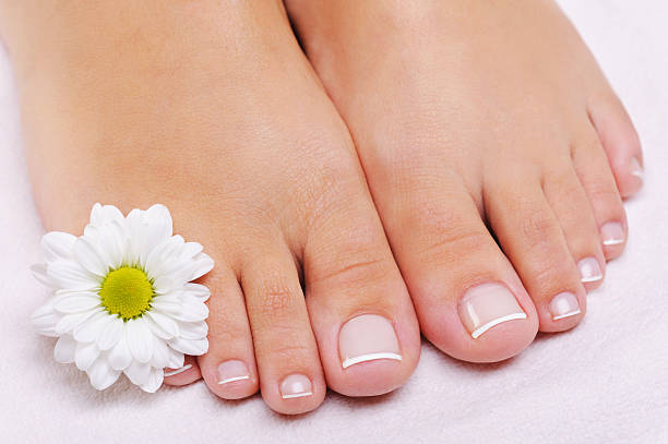 istock French pedicure on a female feet 149426076