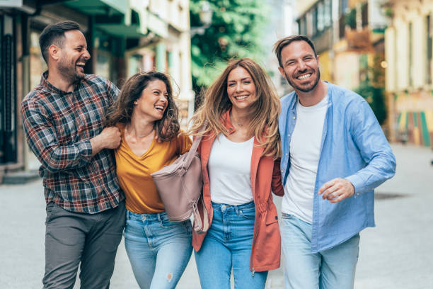 istock Friends having fun outdoors in the city 1494261078