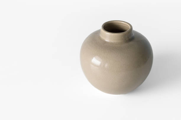 istock Ordinary cheap ceramic vase on a white background. Copy space 1494262360