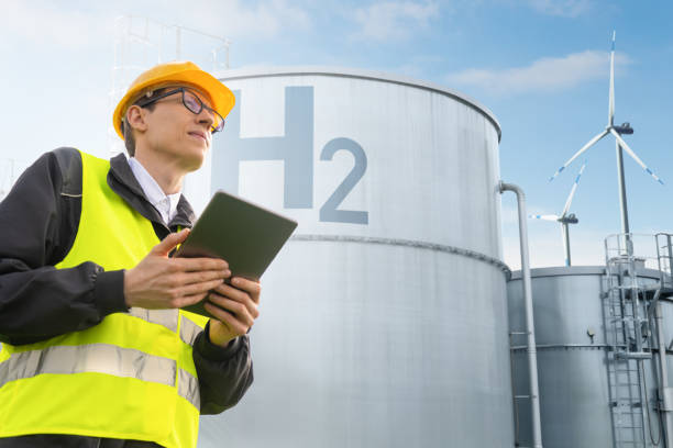 istock Engineer  on a background of Hydrogen factory 1494263862