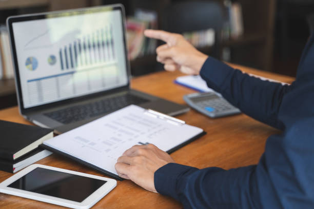 istock Investment planing and strategy concept, Financial data analysis graph business analytics and intelligenceÂ of finance performance. 1494264341