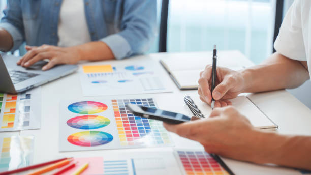 istock Group of startup team coworking with new creative project plan. 1494264385