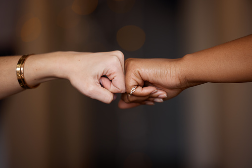 Hands, diversity and fist bump for partnership, unity or trust in agreement deal or collaboration on mockup background. Hand of people bumping fists for teamwork, support or victory win in solidarity