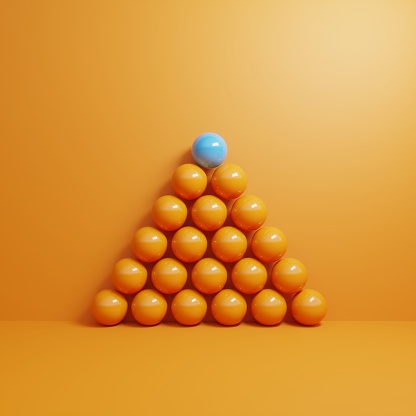 Same colored spheres on pyramid shape, blue one on the top, can be used leadership/individuality concepts. (3d render)