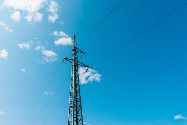 istock Power line and clear sky.High voltage tower for conducting electricity.Electricity transmission power lines.Cloudy summer day. 1494264965