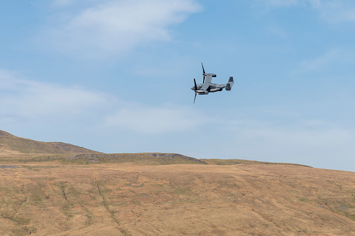 v22 osprey tiltrotor military aircraft low flying in the yorkshire dales