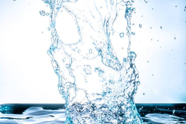 istock splashing water droplets on a white background 1494268753