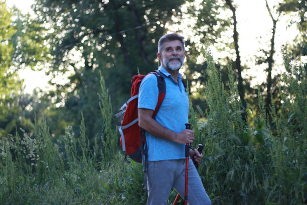 istock Senior man hiking 1494269428
