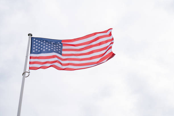 istock American flag waving in wind. 1494269820