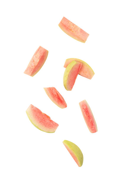 istock Falling Pink Guava slice isolated on white background with clipping path 1494269905
