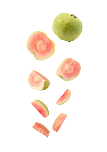 istock Falling Pink Guava slice isolated on white background with clipping path 1494270042