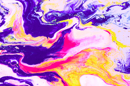 Flowing paint texture. Marbled abstract background