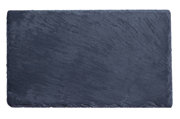 istock Black stone kitchen cutting board isolated on white background 1494274281