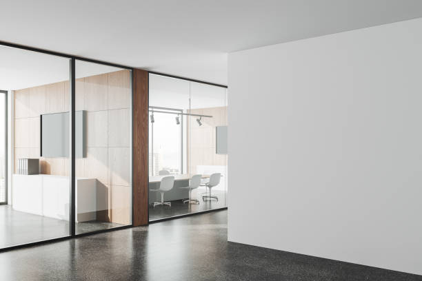 istock White and wooden office hall with mock up wall 1494277428