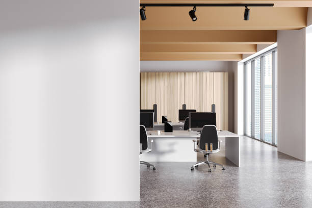 istock White and yellow ceiling open space office with wardrobe and mock up wall 1494278878