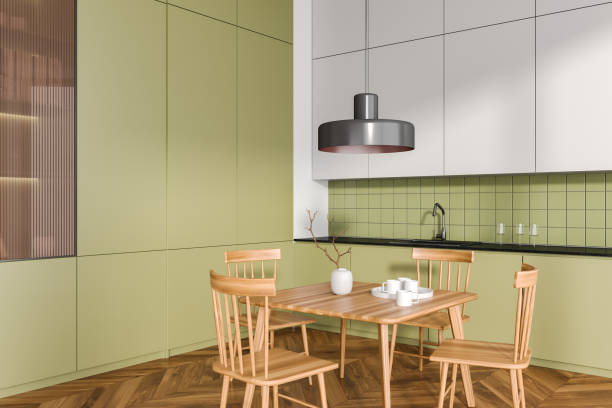 istock Stylish kitchen interior with cooking and eating corner with kitchenware 1494279250