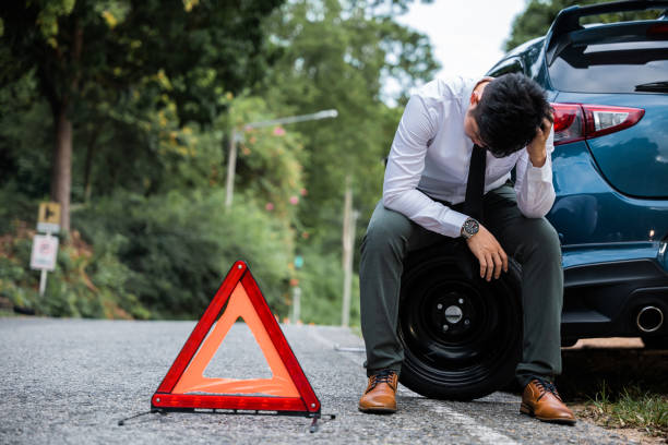 istock Businessman worried car broken. 1494280179