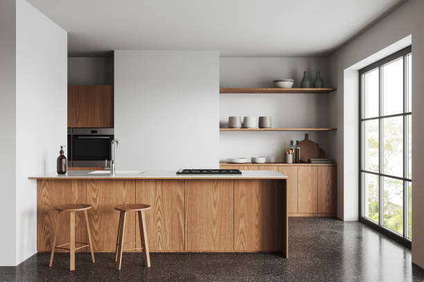 Light kitchen interior with bar countertop and cooking area, panoramic window White home kitchen interior with wooden bar island, two stool and shelves with kitchenware. Cozy cooking and dining area with panoramic window on tropics. 3D rendering kitchen island stock pictures, royalty-free photos & images