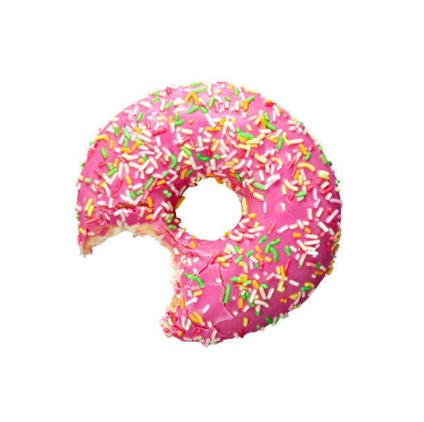One bite missing of donut with pink icing stock photo