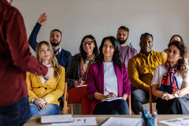 istock Confident businessman holding a presentation for his coworkers 1494282092