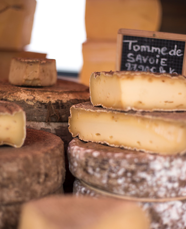 France: Piles of Tomme de Savoie Cheese at Outdoor Market
