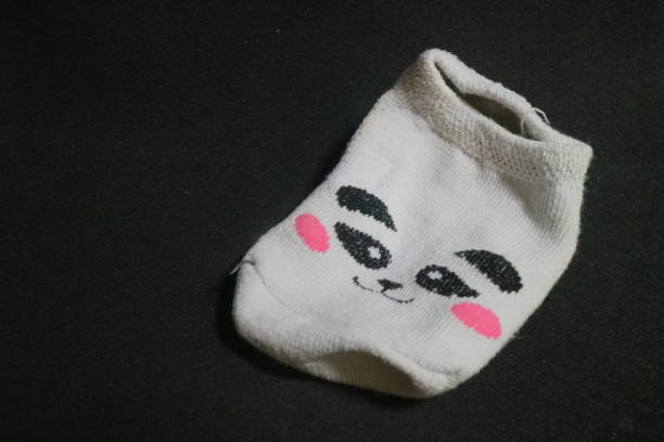 istock Cute baby socks with panda faces 1494283902
