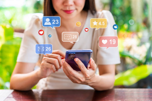 istock Young woman using mobile phone with Social media interactions and notification icons while traveling for summer vacation 1494285796