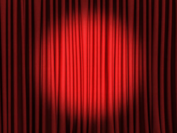 istock red curtain spot light in the middle. 1494289272