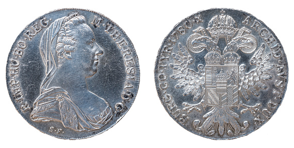 1 Thaler Austrian silver coin from the year 1780. Empress Maria Theresia of Habsburg. Imperial double-headed eagle with the coat of arms of Austria. Hungary, Bohemia, Burgundy and Burgau (Guenzburg).