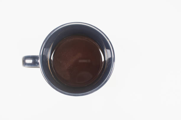 istock Black coffee in a blue ceramic cup isolated on a white background. 1494289622