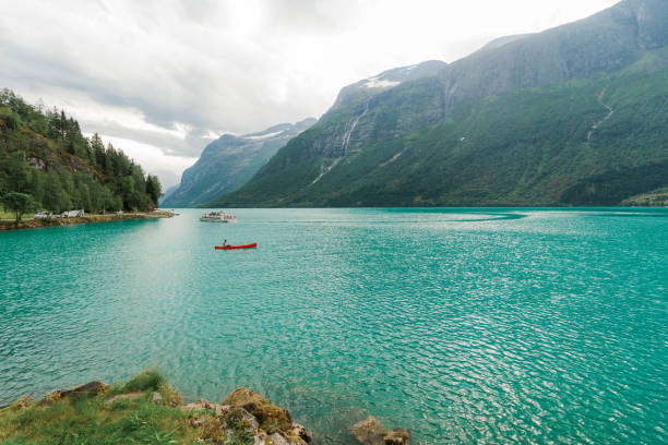 istock Man canoeing on the lake in Norway 1494290875