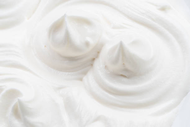 istock Pics and waves in yoghurt or cream surface. Top view. 1494291148