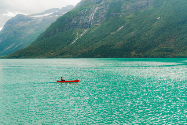 istock Man canoeing on the lake in Norway 1494291500