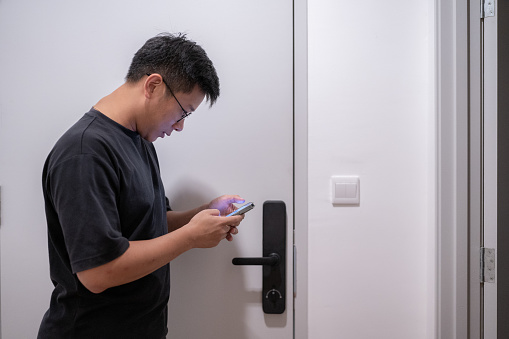Young owner trying to setup smart lock for newly renovated condo