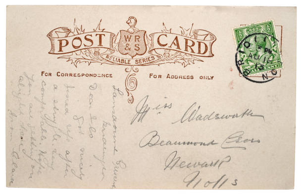 istock Old vintage postcard, handwriting British stamp 1910s 1494293696