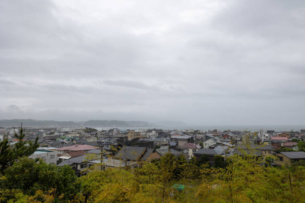 Cityscape and bay from Hasedera temple on a rainy day stock photo