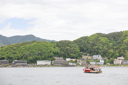 Yamanashi, Japan - May 8, 2023 : Landscape of boat port at lake kawaguchiko