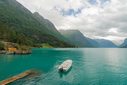 Scenic view of boat on blue calm lake in Norway