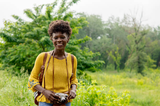 istock Woman is enjoying her vacation in nature 1494297716
