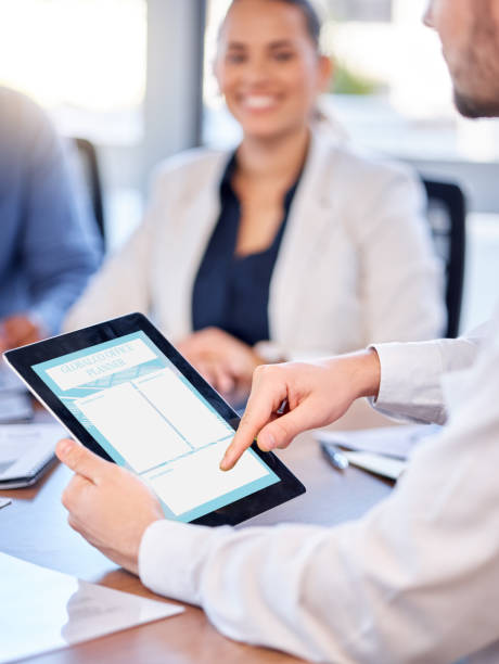 istock Business man, hands and tablet in meeting for schedule planning, notes or minutes in collaboration. Hand of male team leader holding touchscreen for planner, reminder or managing corporate tasks 1494298053