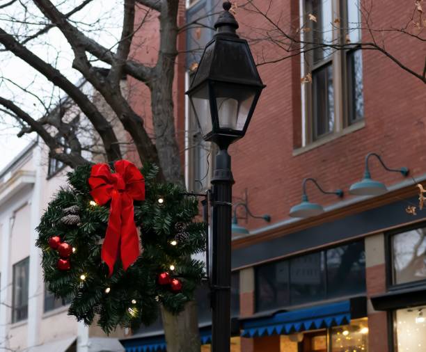 istock Decorated lamp post in the street 1494309047