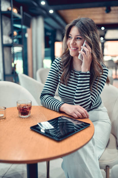 istock Phone Calls, Drinks And Digital Tablet Online Shopping By Smiling Female 1494313876