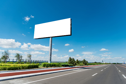 Blank billboard by the highway.