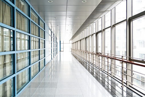 Long corridor in modern office building.