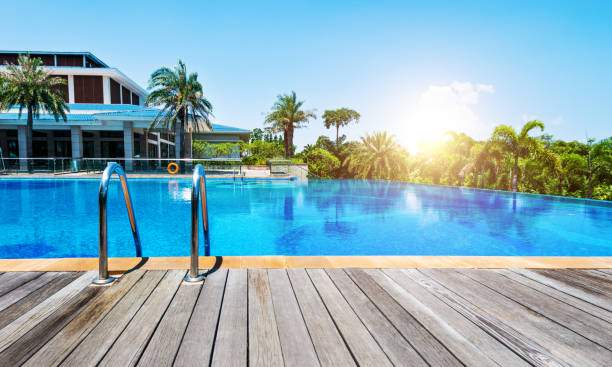 istock Luxury swimming pool with blue water 1494315129