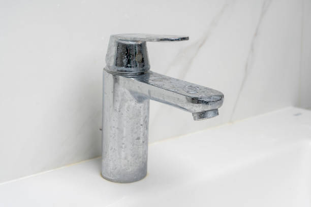 istock dirty water faucet covered in soap and limescale 1494315460