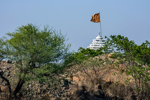 Pune, India - May 28 2023: Hindu Khandoba Temple on a hillock at Kedgaon near Pune India.
